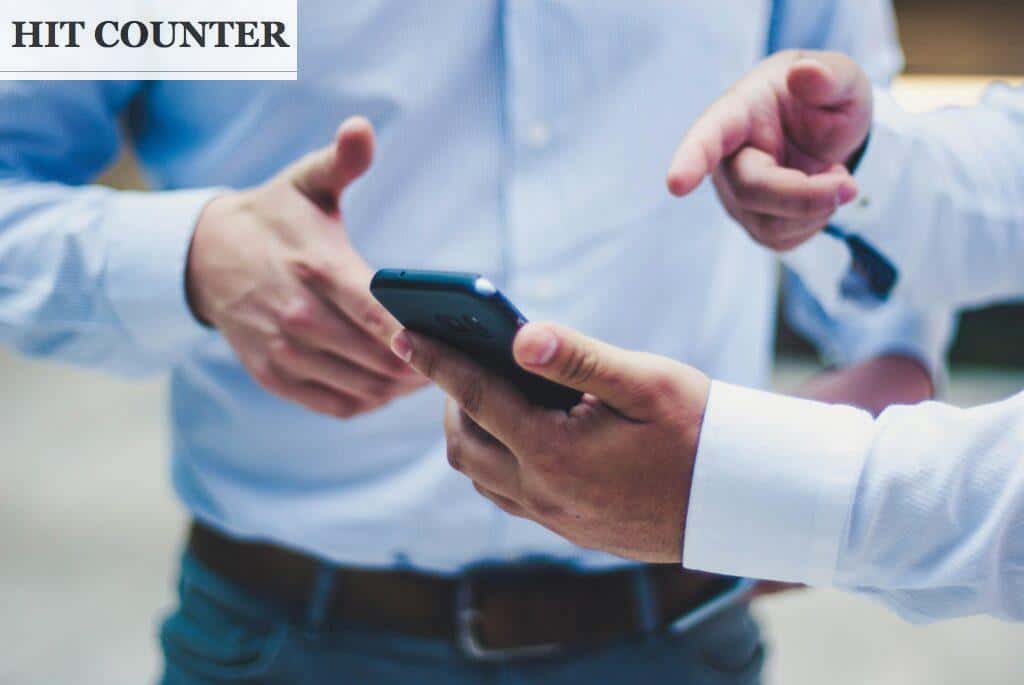 person holding black smartphone